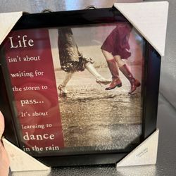 A Glass Picture With The Saying Dancing In The Rain 