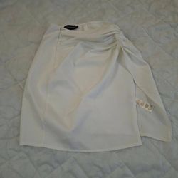 PrettyLittleThing white mini skirt