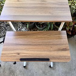 Adjutable computer table