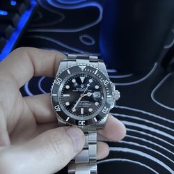 Watch with box and papers