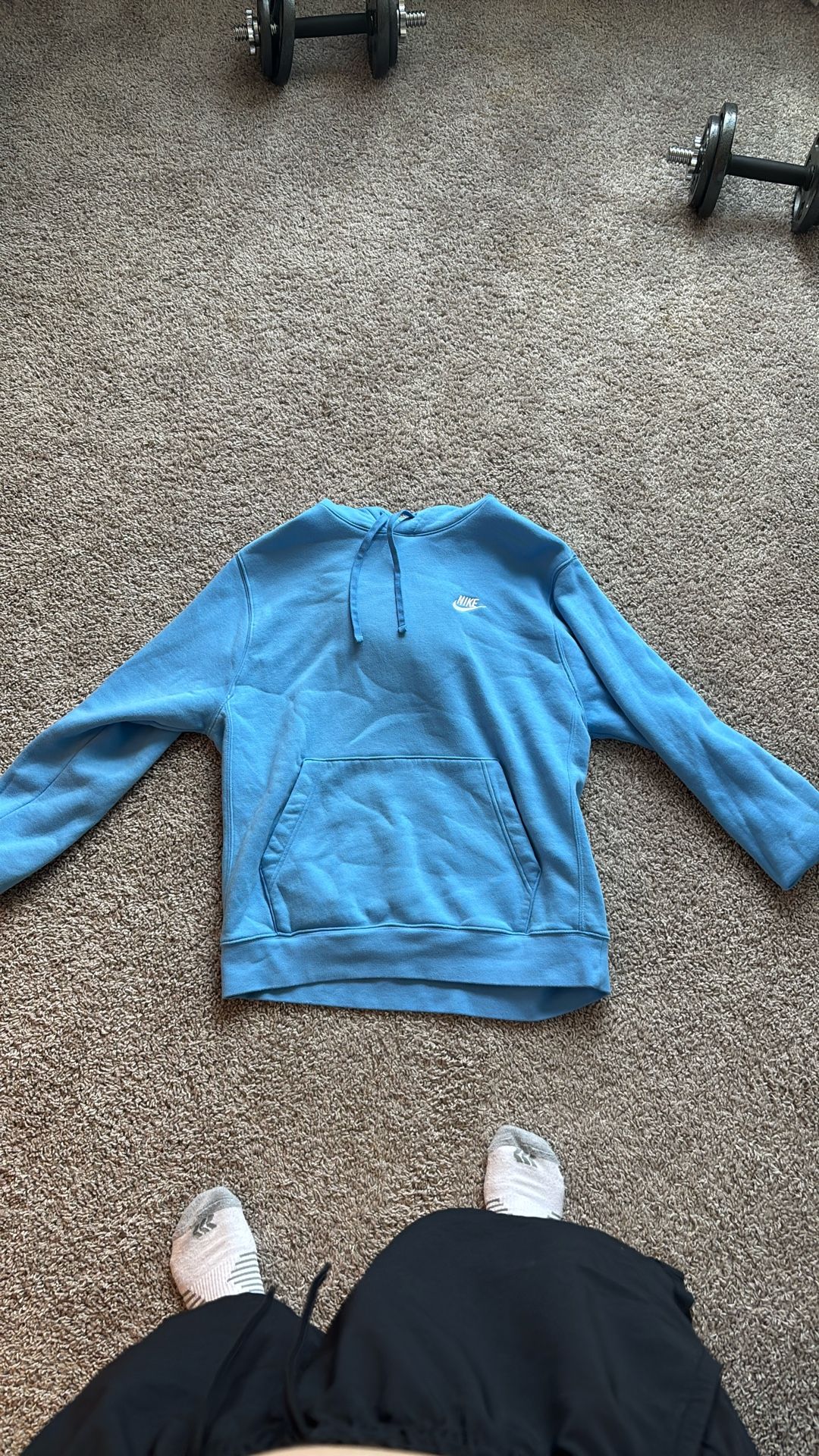 blue Nike sweatshirt