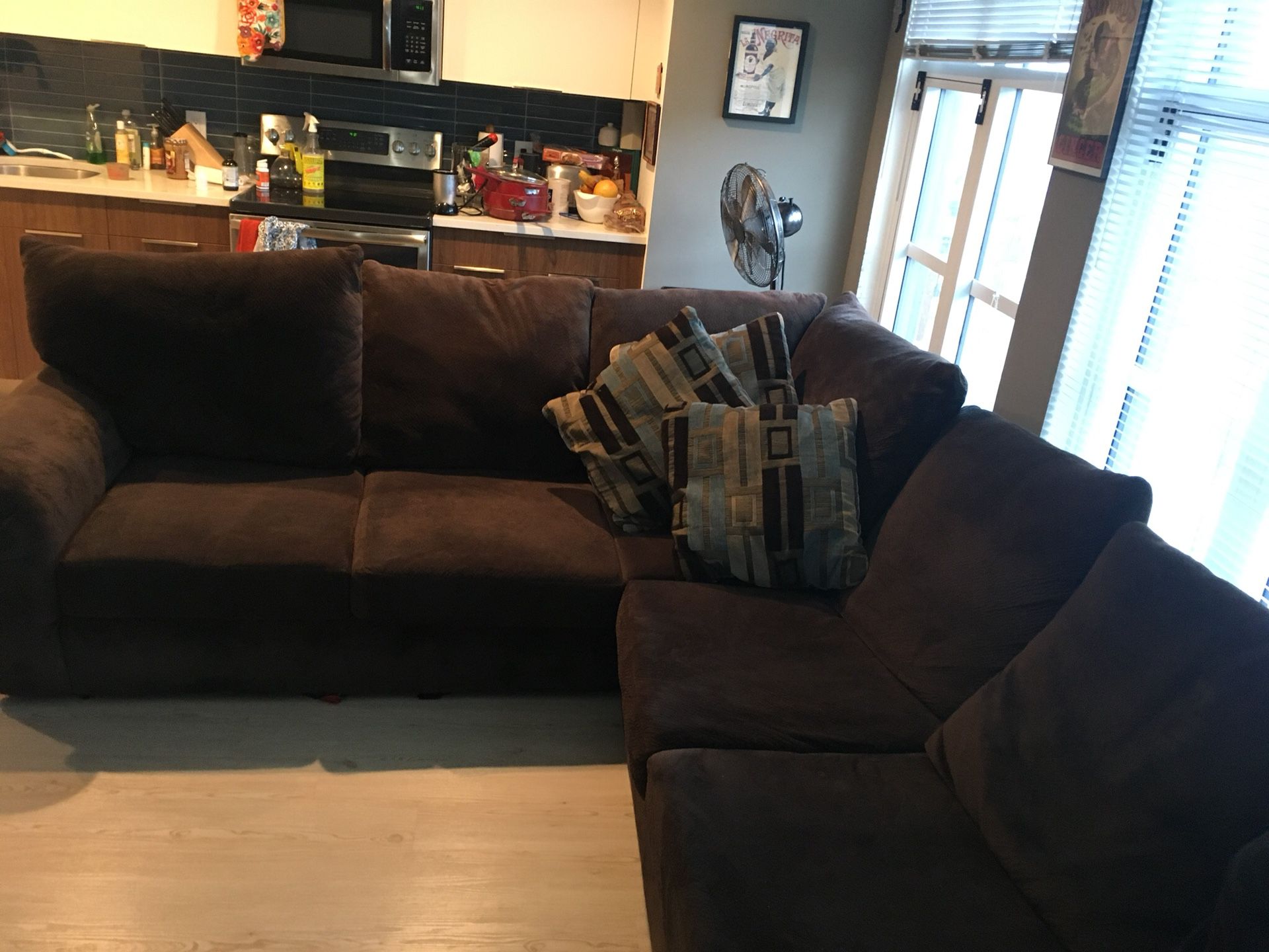 Large brown sectional couch