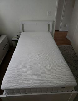 Twin bed with mattress