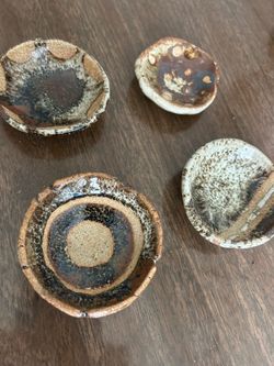 Set of 4 small plates by amateur potter