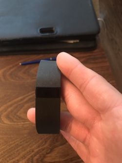 Fitbit Charge. Bought and never was used it ; no charger