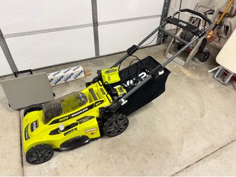Ryobi Lawnmower and Battery/Charger