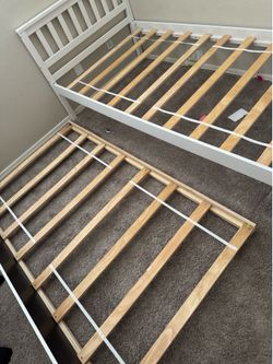Twin bed with trundle and mattresses