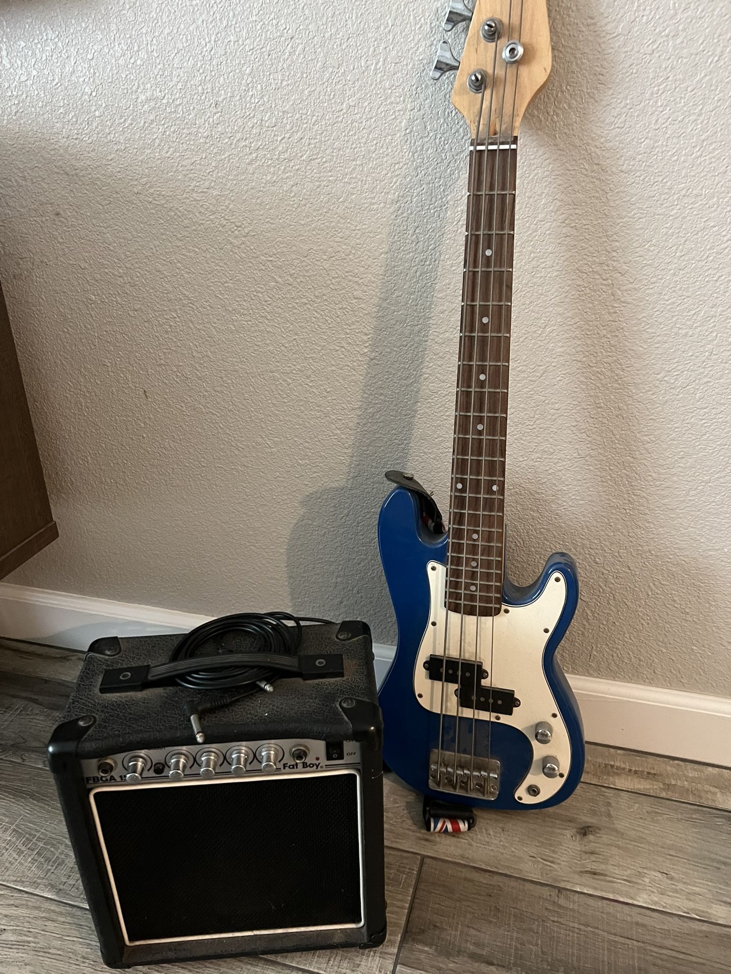 Electric Bass Guitar And Amp