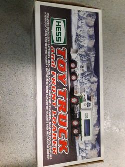 In box 2008 hess toy truck and front loader