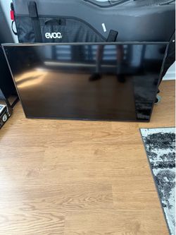 Sharp 50” 4K UHD Smart Roku TV + Cantilever Wall Mount — Bundle Deal