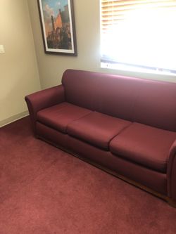 Sofa. Wine colored couch for sale