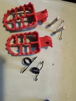 Foot Pedals An Air Filter For Dirtbike