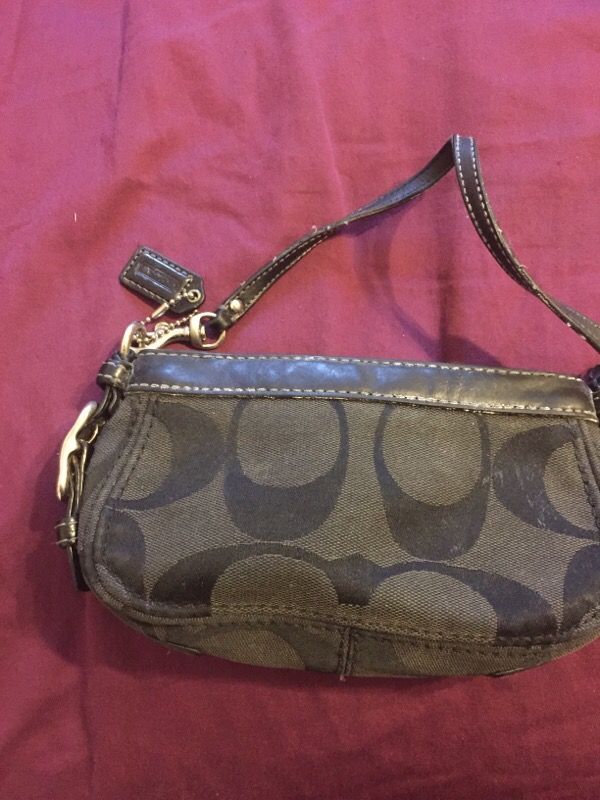 Coach wristlet in decent condition