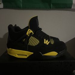 Yellow Thunder Jordan 4s