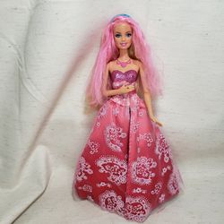 Mattel 1998 color changing Barbie pink and blue dress . Dress changes and hair changes . Doll sings . Good condition and smoke free home. 