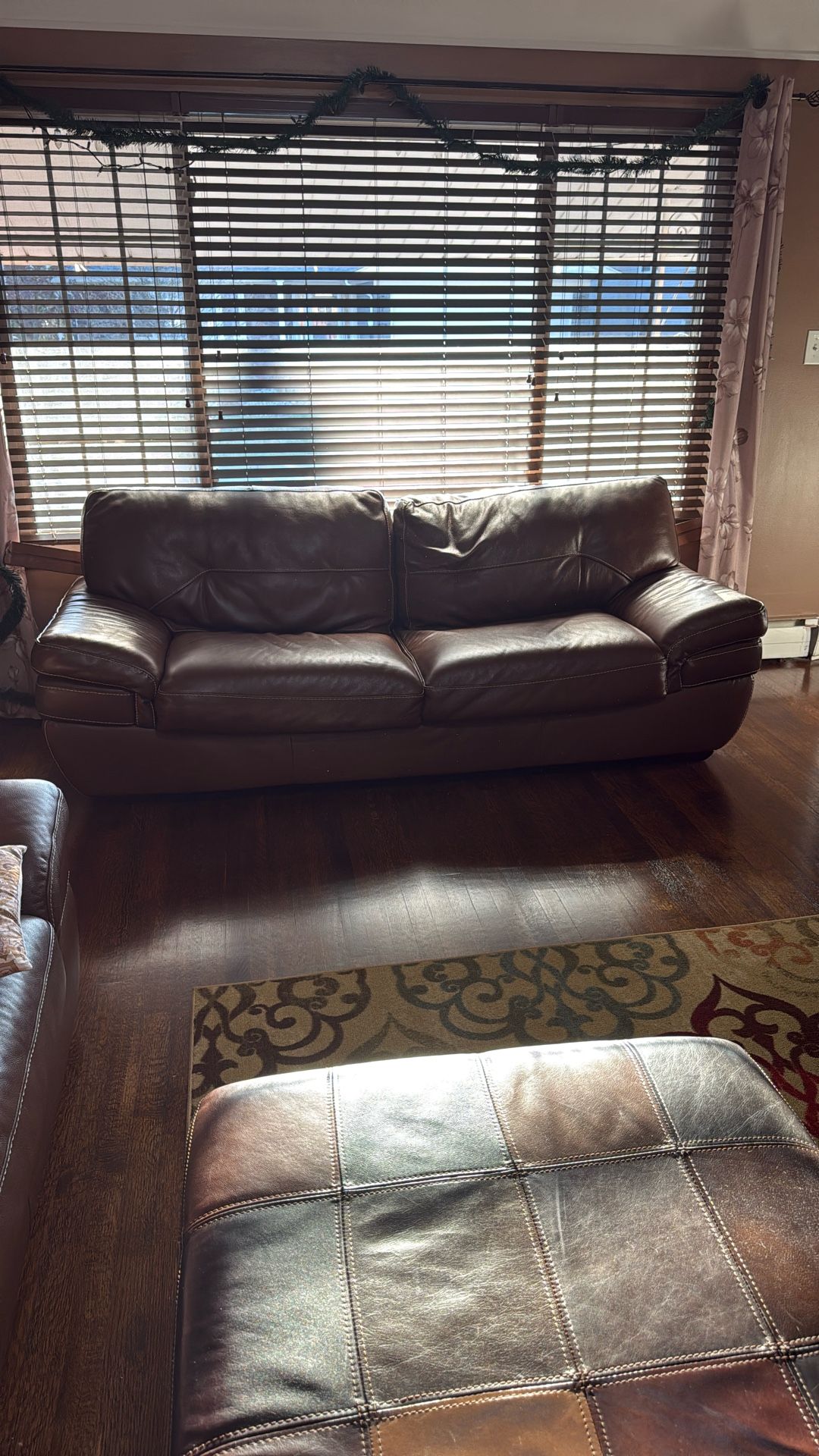 Two Sofas And An Ottoman
