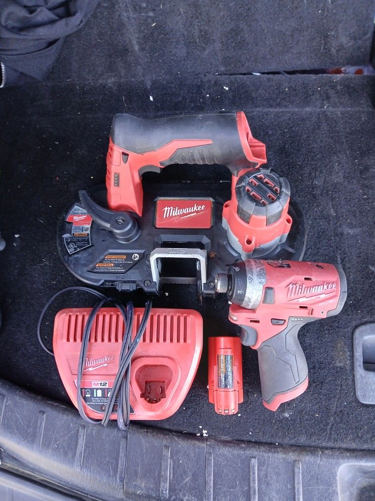 Milwaukee 12V Band saw + 12V impact Driver/ with battery and charger/for $275( delivery available)