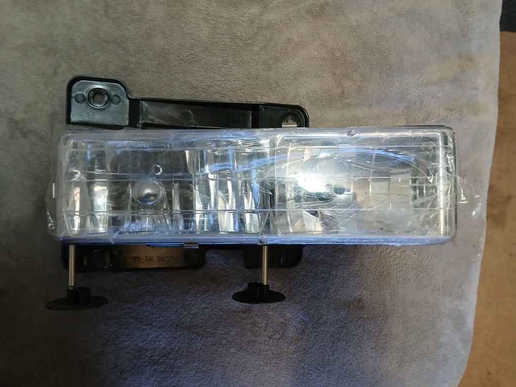 Chevy Suburban Head Light Assembly New And Rear Used Assembly 