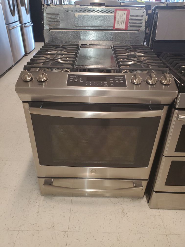 🔥🔥GE slide in gas stove five burners and convection oven in excellent condition 90 days warranty 🔥🔥
