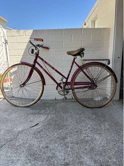 Vintage Sears Free Spirit maroon steel cruiser bicycle