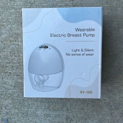 Wearable electric breast pump