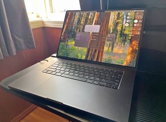 Apple MacBook Pro 16-inch, late 2024 model w/ box.