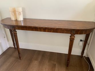 Baker brothers  late 19th-century mahogany demilune console table with parquet top.