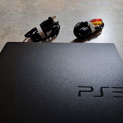 Playstation 3 With 2 Dual Shock Controllers and 17 Games Including Rocksmith W/adapter Cable