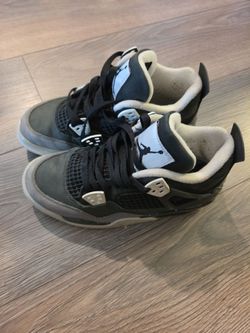 Air Jordan 4 Black and White Sneakers