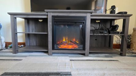 Tv stand with electric fireplace