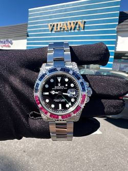 Rolex GMT Master 40mm II 116710 diamonds rubies sapphires set stainless steel watch