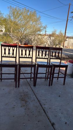 Four wood chairs, no table