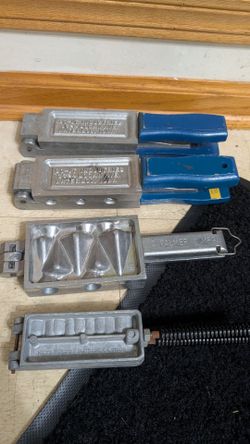 These are aluminum Do-It Industries molds used for casting fishing lures, specifically jig heads model JB-6-1438 & JB-7-48 & C. PALMER MFG 351 & TJM32