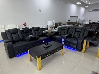 Electric reclining sofa and loveseat. Down payment $85