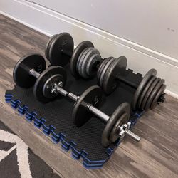 150lb Standard weights + 2 pair adjustable dumbbells + gym mats