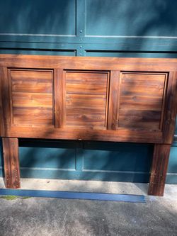 Bed frame with headboard