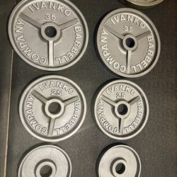 Set of Olympic Vintage IVANKO Weight Plates: Pairs of 45s, 35s, 25s and 10s.  Reconditioned  Total: 230 #