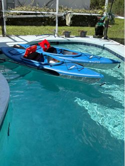 Two Pelican Kayaks