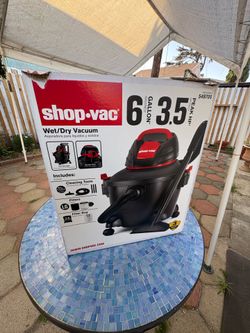 SHOP-VAC. VACUUM
