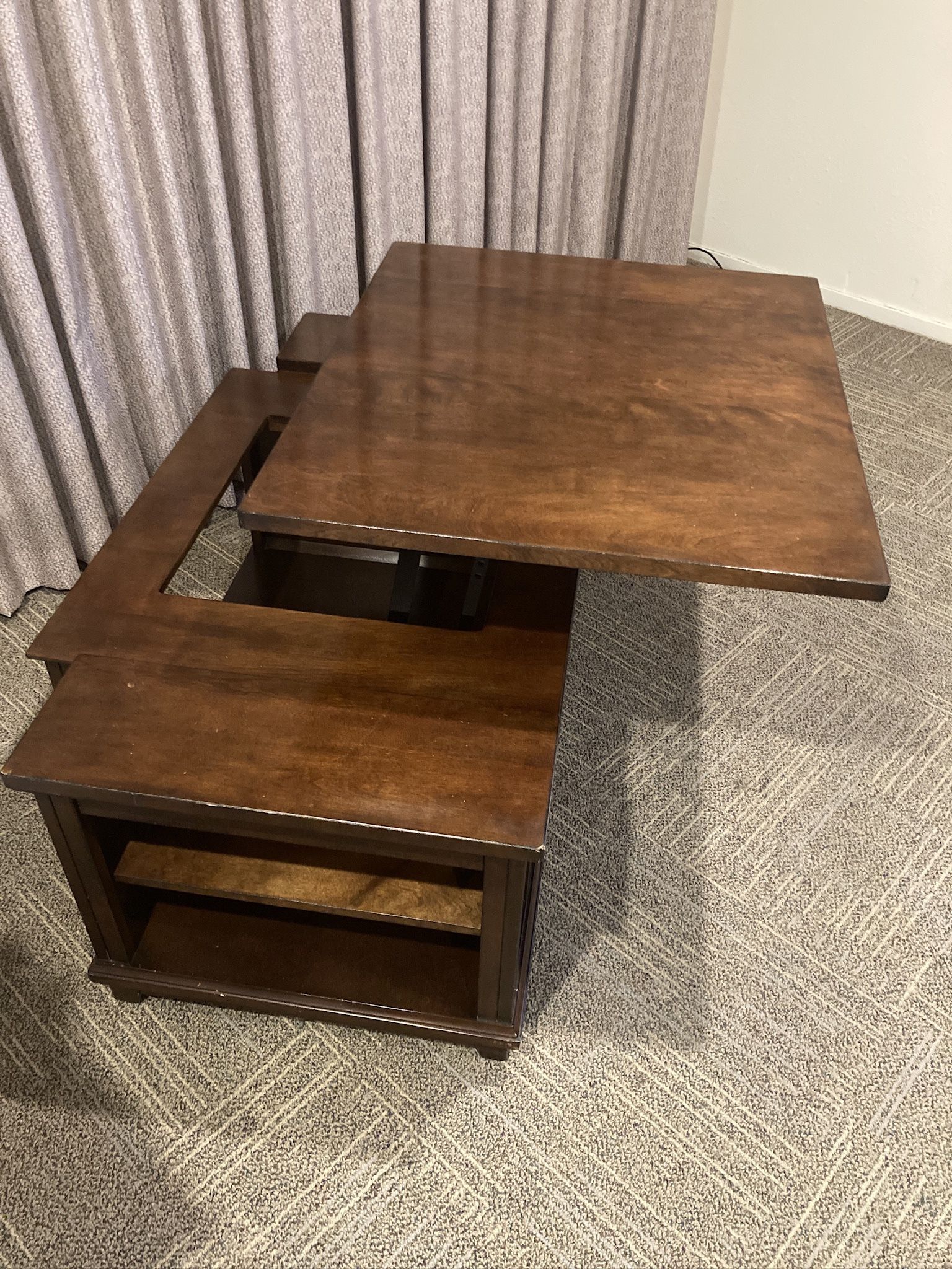 Coffee table with lift