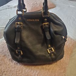 Michael Kors  Black leather handbag very nice and a little heavy