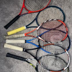 NO SEPARATE 9 used tennis rackets in good condition different colors I do not sell them separately I do not accept offers IN SPORTS STORE A RACKET COS