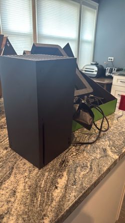 Xbox Series X 1 TB with box two controllers
