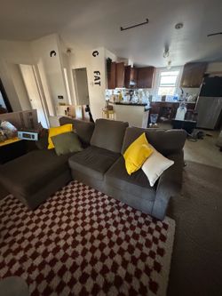 Brown small comfy couch