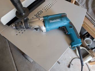 Makita electric hammer drill used like new $80