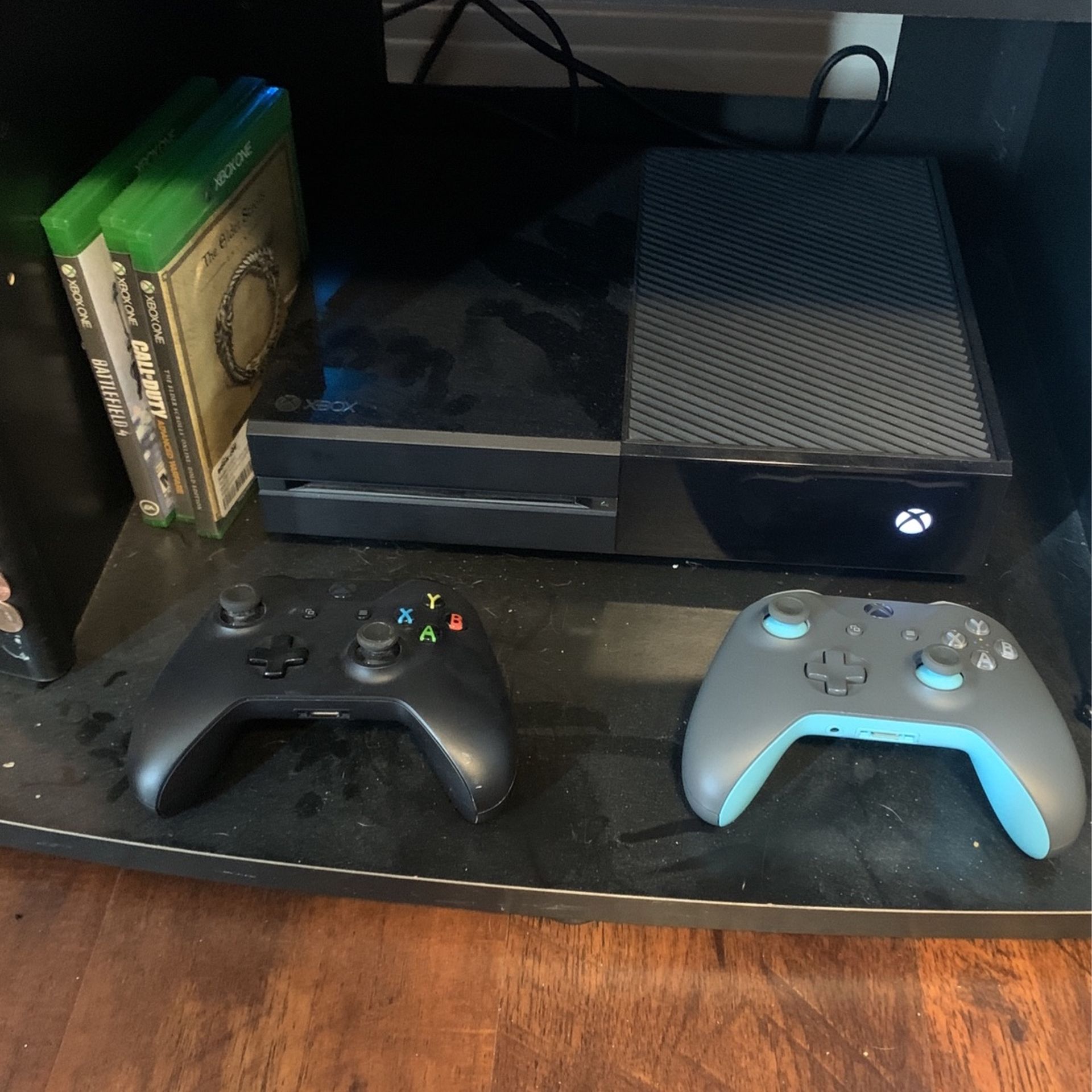 Xbox One And Headset With Two Controllers