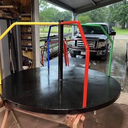 Merry Go Rounds And Spinning Teeter Tauters