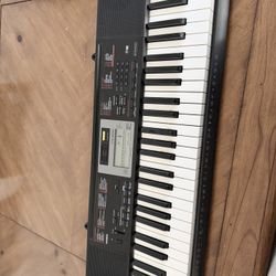  teclado portátil Casio CTK-2090