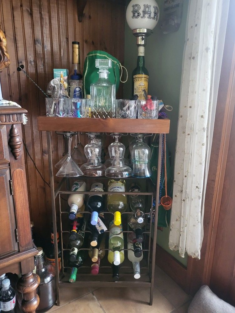 Bar W/ Removable Glass Tray. Has Glass holders &16 Bottles. Towel Holders on side. 18"W×34"T×13"D.