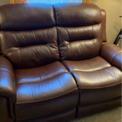 Brown Two Piece Leather Couch/ Table With Four Chairs Everything Is Fairly Brand New 